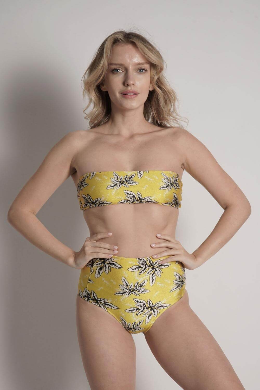 https://www.sauipeswim.com/cdn/shop/products/strapless-bandeau-bikini-top-yellow_1200x.jpg?v=1667349114